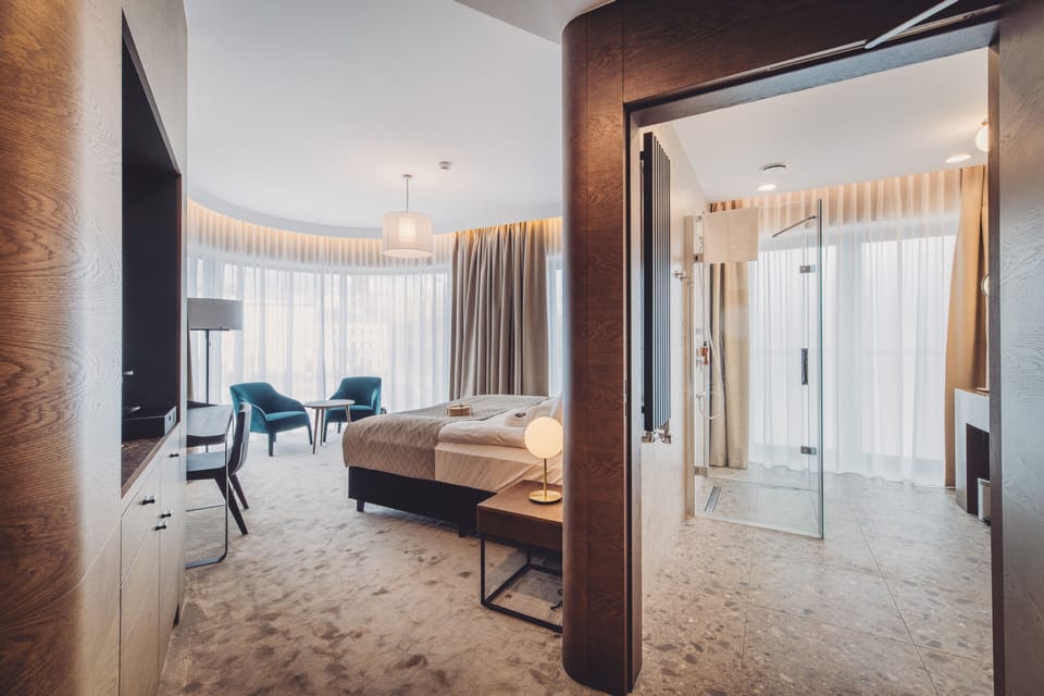 Deluxe Double Room | Living area | Flat-screen TV