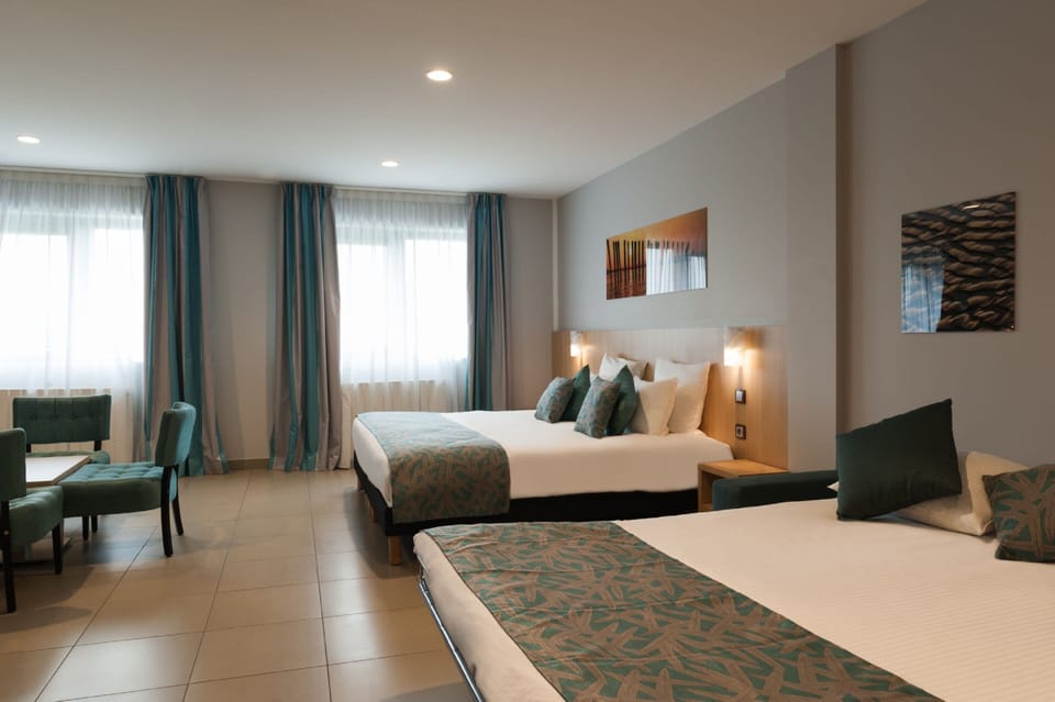 Double or Twin Room, Accessible | Minibar, desk, blackout drapes, soundproofing