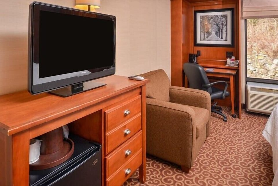 Desk, blackout drapes, soundproofing, iron/ironing board