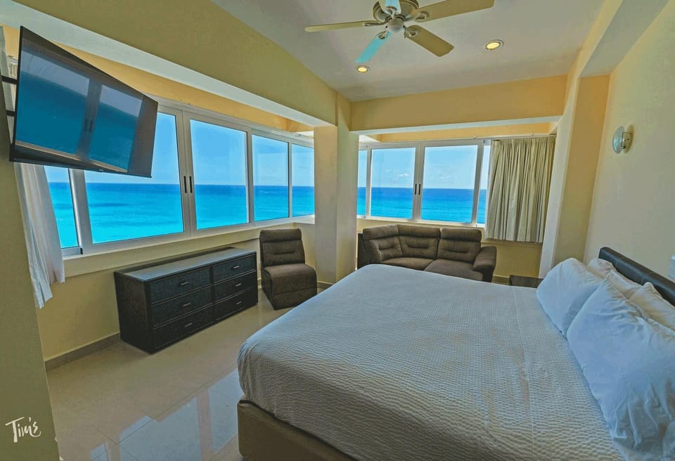 Penthouse 1 of 4:  The Master faces straight out to the Ocean, has a King Bed, and also has Great Views of the Beach as well