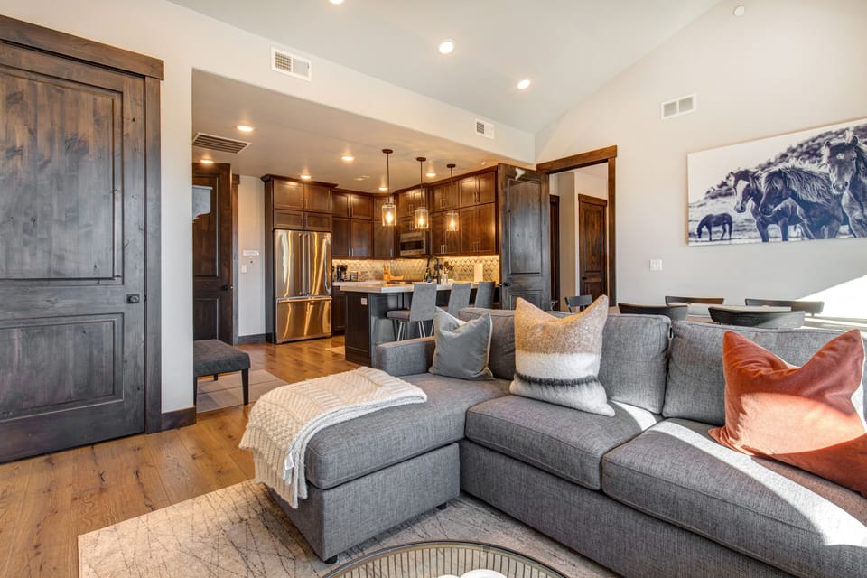Living Room with sleeper sofa, 55" Samsung smart TV and cozy gas fireplace.