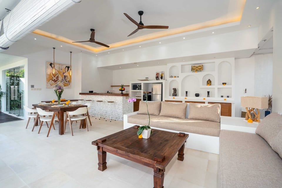 Basic Villa, Multiple Beds | Living area | 32-inch flat-screen TV with digital channels, TV, stereo
