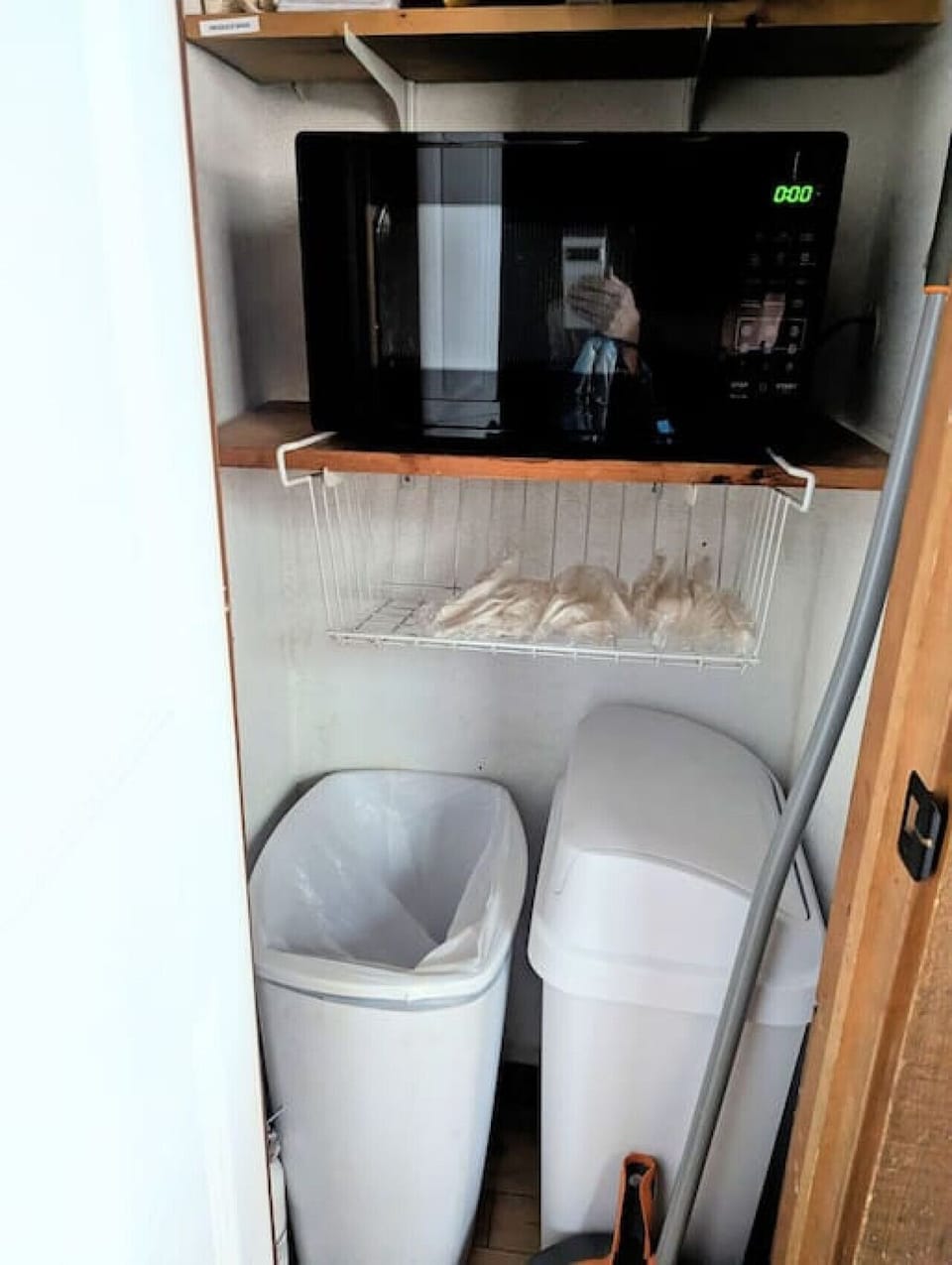 Pantry closet for trash, microwave and any extras