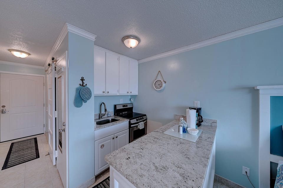 Kitchenette includes stove, oven, and sink.