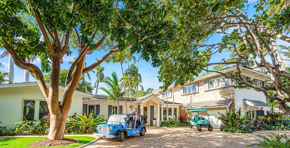 This Spanish Revival ample residence is located in the private  Harbor Beach neighborhood.