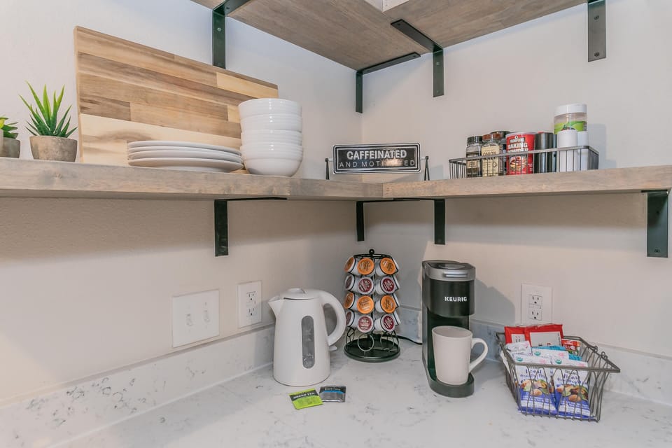 Complimentary coffee bar w K-cups, teas and snacks