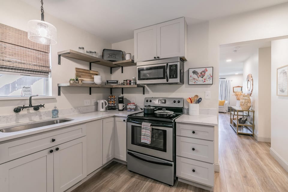 Kitchen comes stocked with all major appliances, cookware and dishes. 