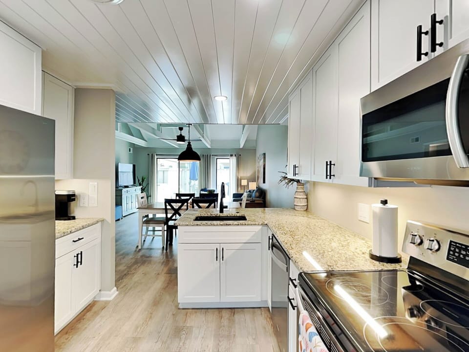 Condo, Multiple Beds, Pool Access (#520 - Pet Friendly) | Private kitchen | Coffee/tea maker, fridge, microwave, oven