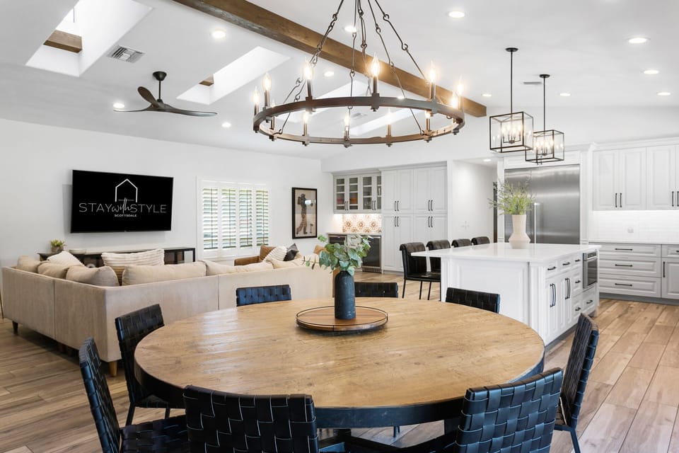 Great Room with Dining table, living area, and kitchen