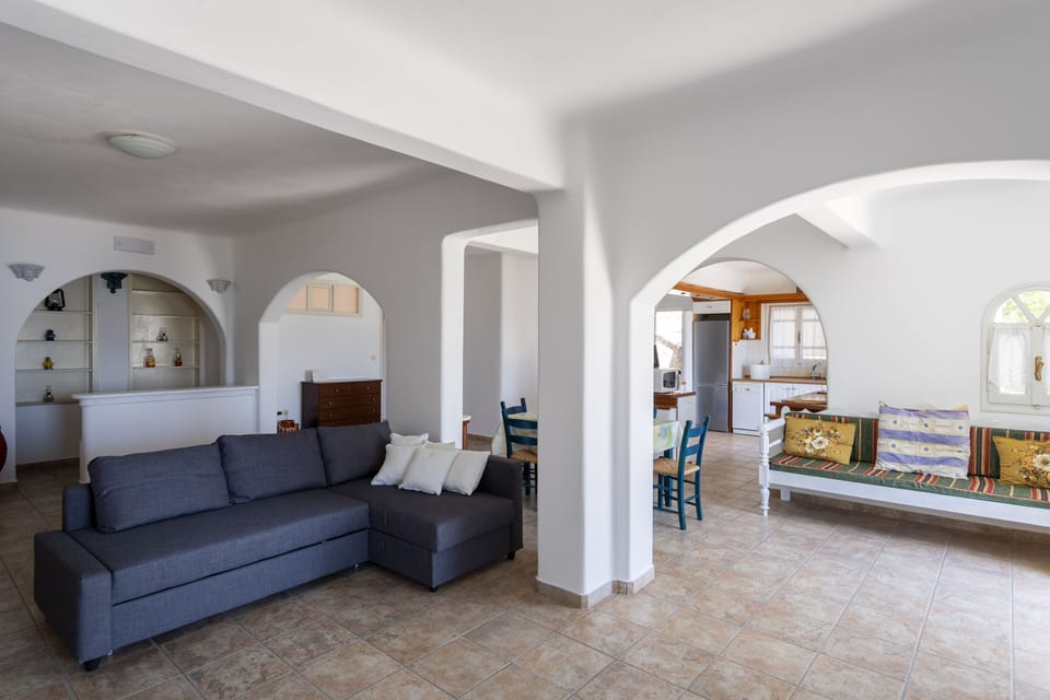 Villa | Living area | 40-inch flat-screen TV with cable channels, TV, fireplace