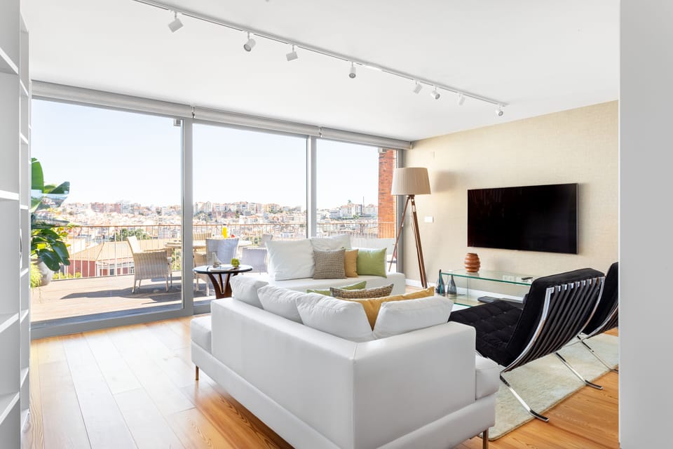 Spacious, luxurious and bright living room with a large terrace