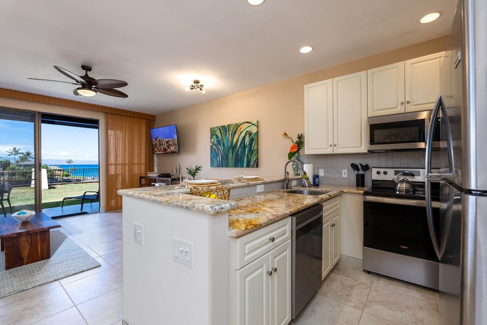Spacious condo with ocean views - new furnishings and upgrades throughout this unit!