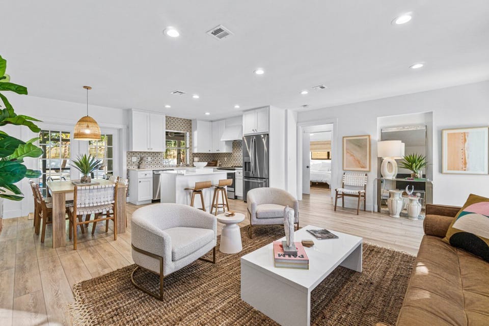 Living room opening to dining area and updated kitchen