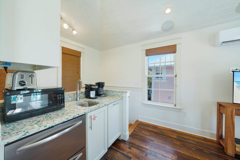 MODERN KITCHENETTE W/GLASS INLAID COUNTERTOPS