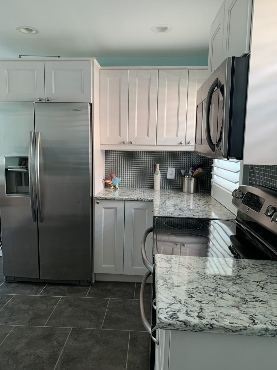Large open kitchen with numerous amenities & extras for your stay. Fully stocked