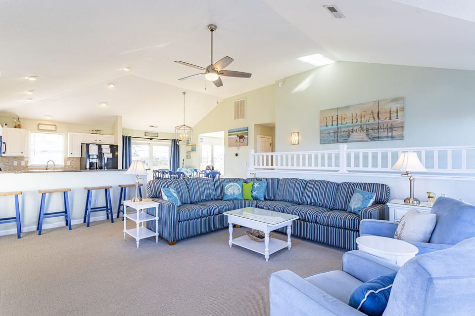 Living Room - Thoughtfully designed with the ocean in mind, this sea of blues provides a relaxing and inviting living space.