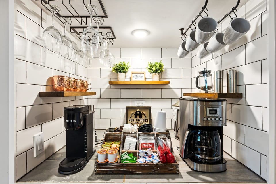 Fuel your Door County adventures at Northwoods Farmstead's dedicated coffee bar. Brew a fresh cup, enjoy a quiet moment before the day begins, and settle into the slower pace of farmhouse living. Because every great vacation starts with great coffee.