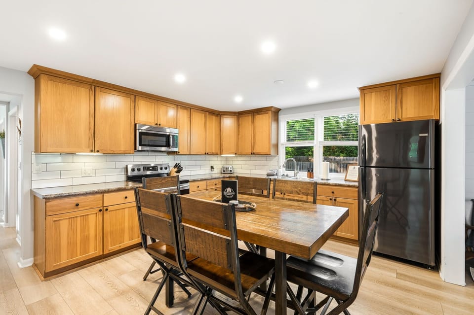 The heart of Northwoods Farmstead is its spacious, fully stocked kitchen. With ample counter space, modern appliances, and room for everyone to gather, it's the perfect place to prepare family meals and share stories.