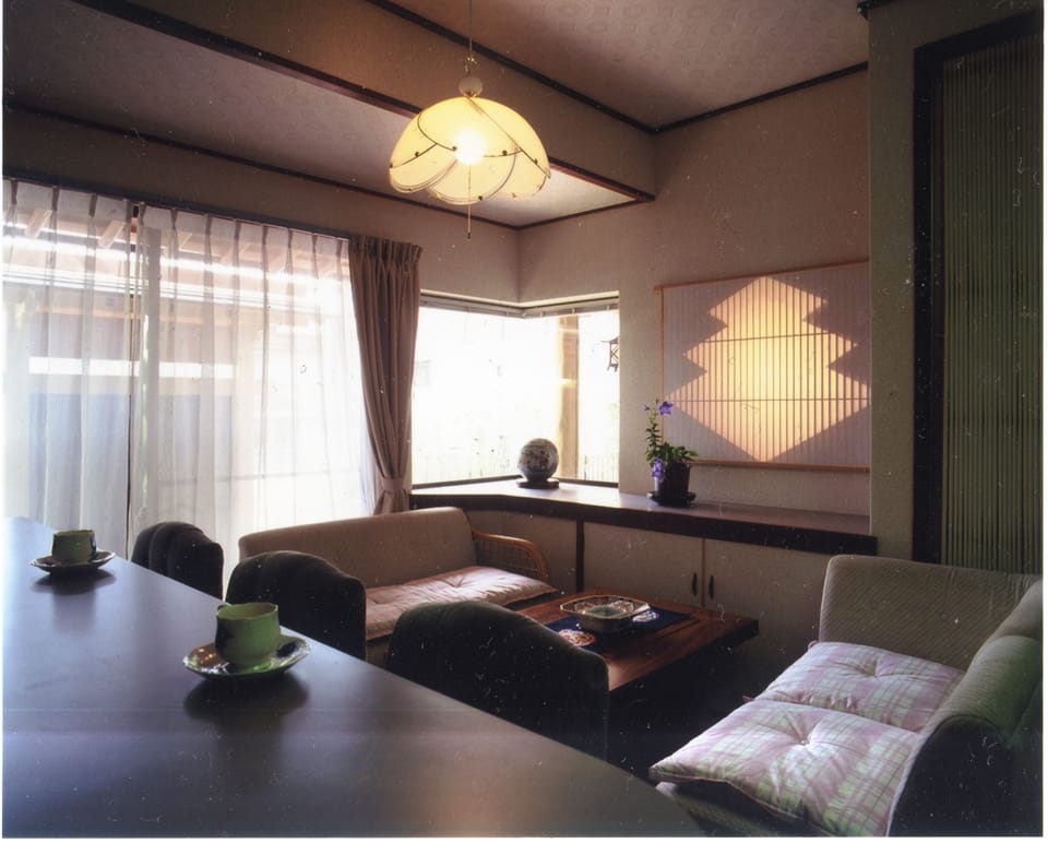 Economy Triple Room with 3 Japanese Futons | Living room | TV