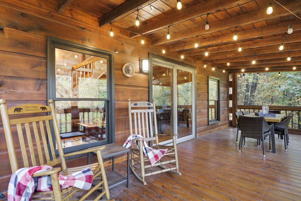 String-lit porch perfect for crisp fall nights & family meals.