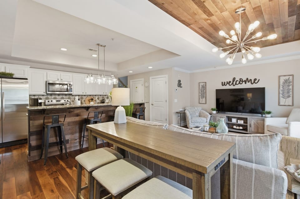 Modern kitchen with an open view of the living area.