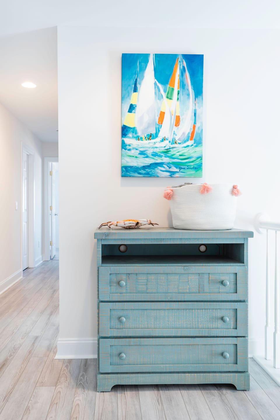 We supply all beach towels and bath towels,  found here in the 2nd floor hallway