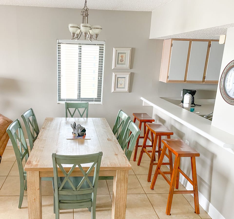 Dining Room Table seats 6 comfortably. 3 bar stools are also available. 