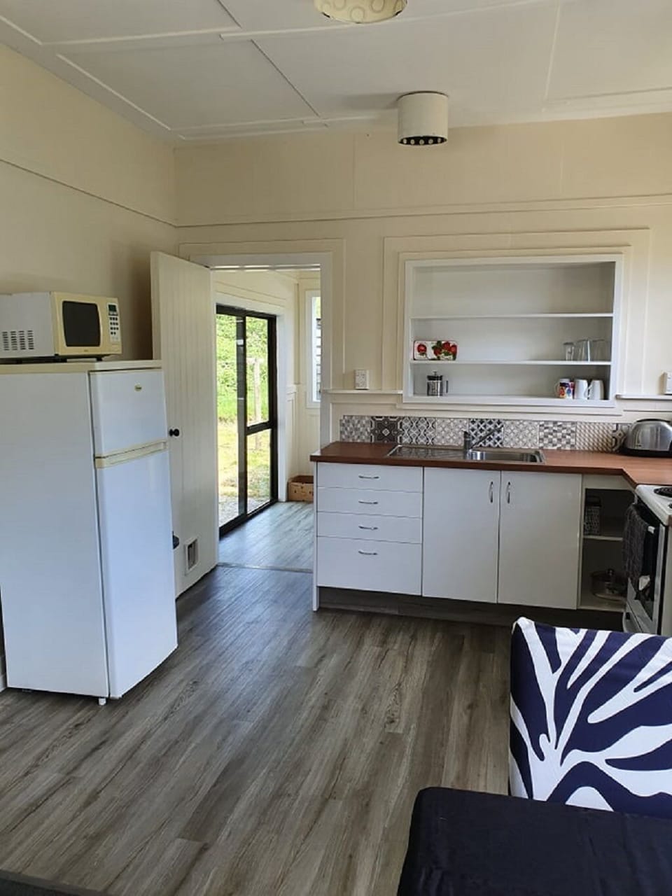 Kitchen. Available to use: Fridge/Freezer, oven, microwave, toaster, jug + more