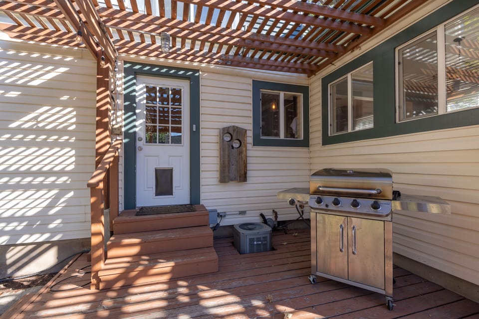 Back entrance and gas grill