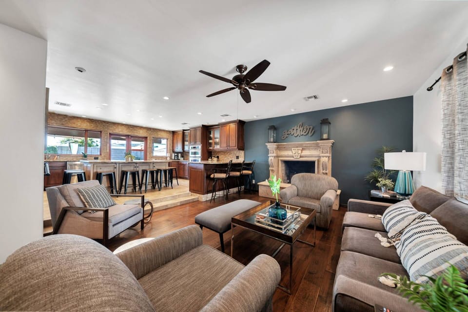 Open floor plan with kitchen flowing to the living room