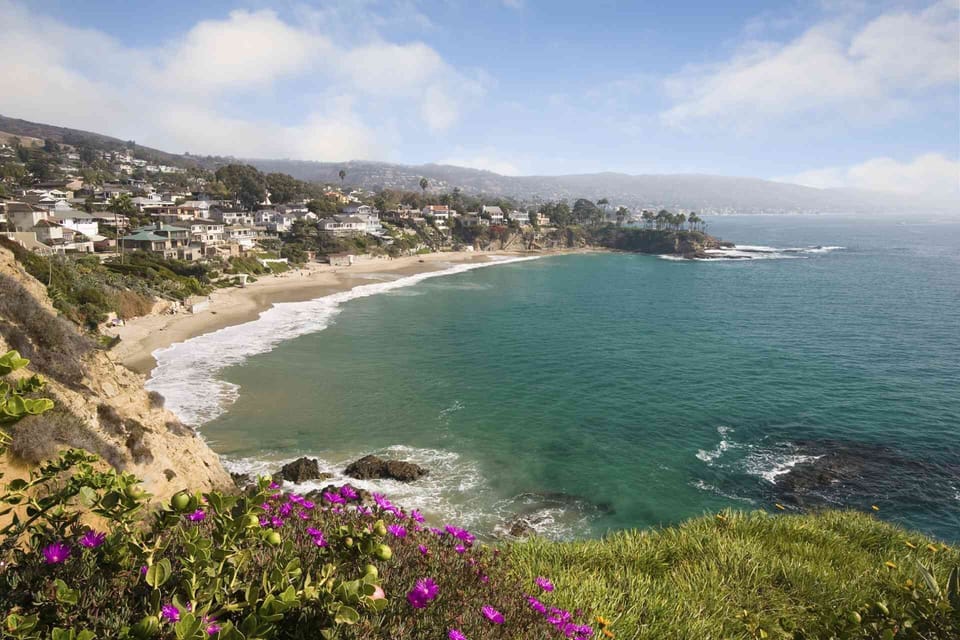 Laguna Beach, Orange County coastal luxury—stunning ocean views, vibrant art scene, and upscale California dream living.