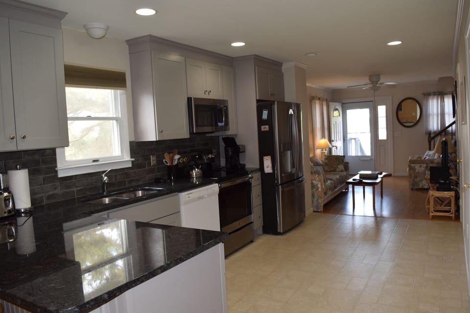 High end kitchen with granite countertops and new stainless steel appliances!