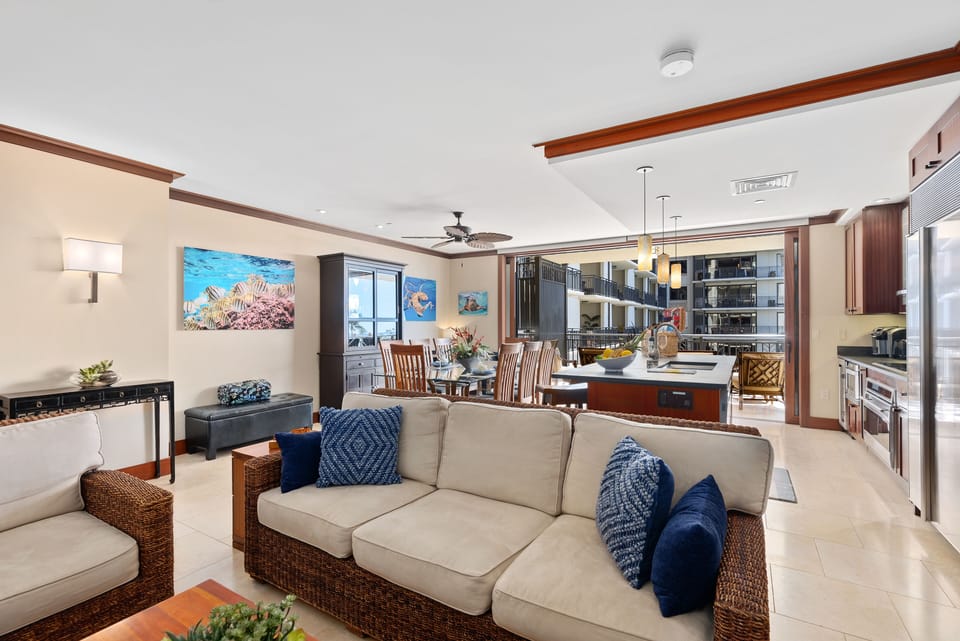 Living room, dining area and kitchen plus Lanai in the background.