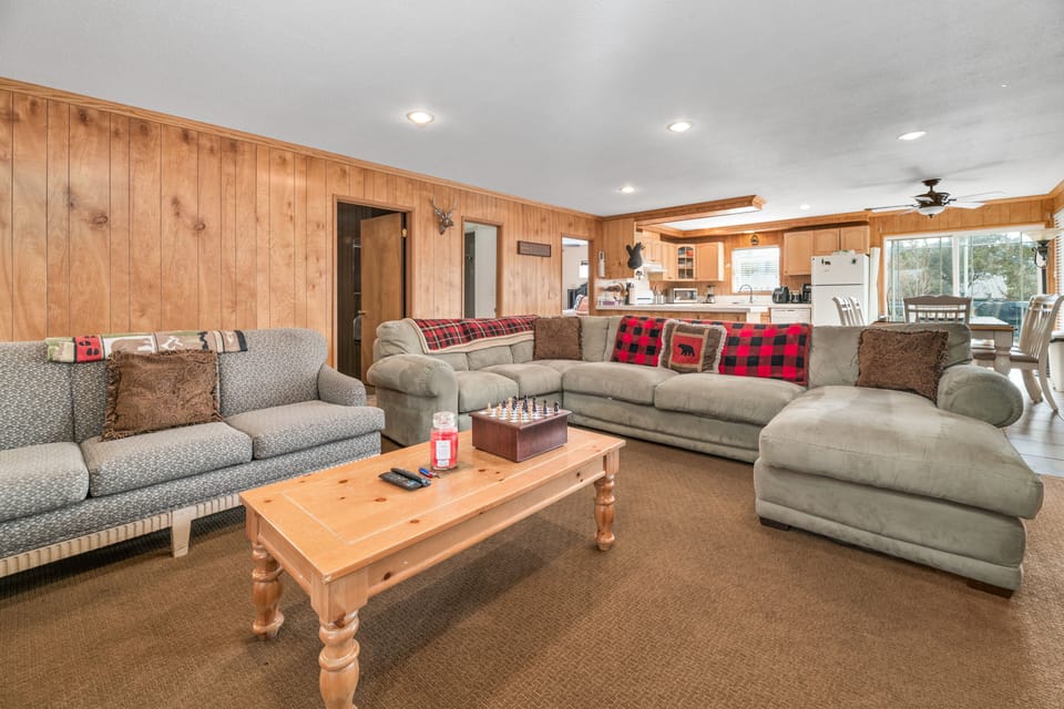 Living Room. - Adorable Living Room with plenty of comfy seating, TV's and a fireplace!