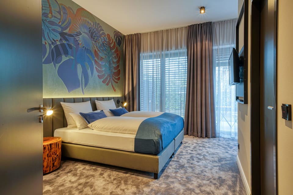 Superior King Room | Living area | Flat-screen TV, heated floors