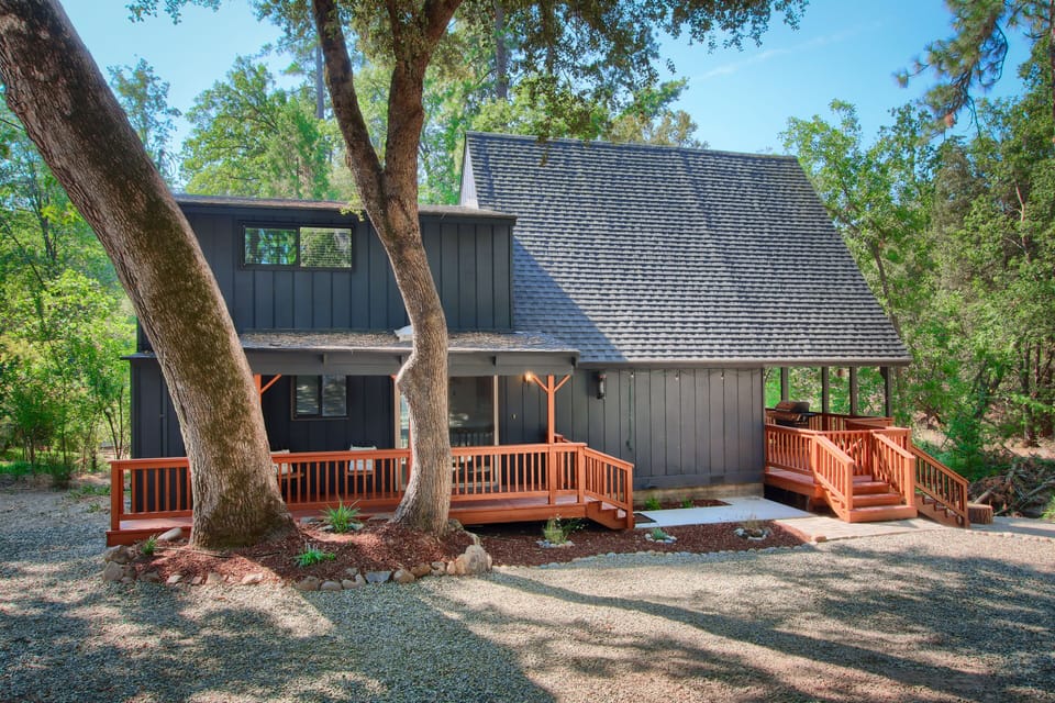 Rustic cabin with inviting stairs, featuring natural materials and warm charm.