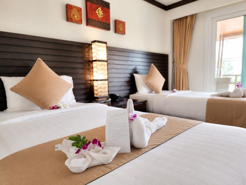 Deluxe Room, Balcony, City View | In-room safe, desk, blackout drapes, WiFi (free)