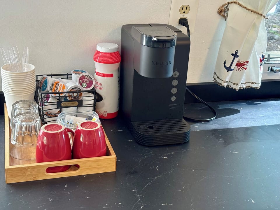 Keurig coffee maker and an assortment of K-Cups