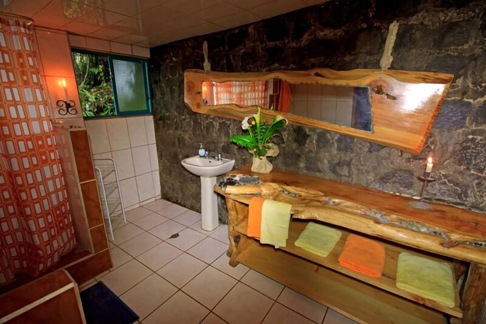 Shower, rainfall showerhead, towels, soap