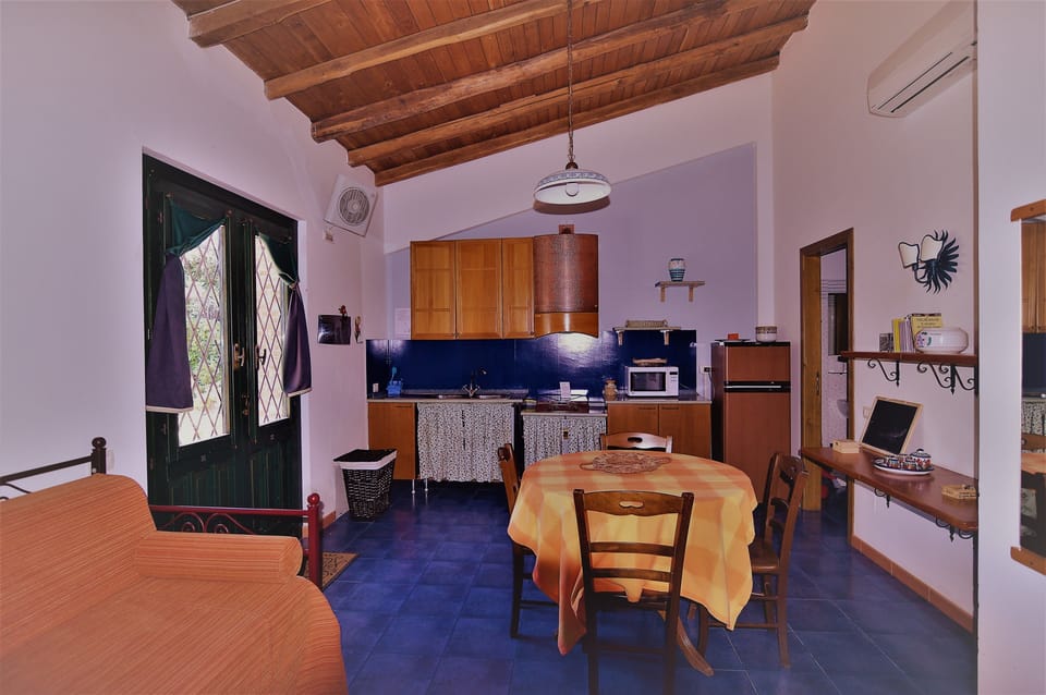 Family Villa, 2 Bedrooms, Kitchenette, Garden View | Frette Italian sheets, premium bedding, down comforters, minibar