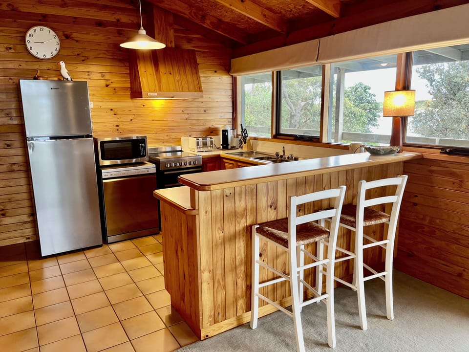 Well equipped kitchen with great views - new stove, fridge and dishwasher.