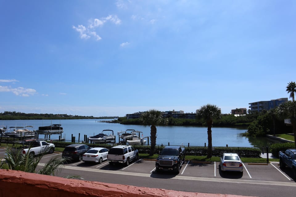 Waterfront view from the front door and back balcony of this 2 B - Waterfront view from the front door and back balcony of this 2 BR 2 BA unit.