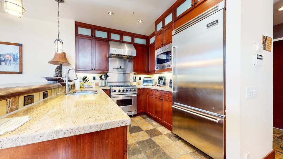 Townhome, 4 Bedrooms | Private kitchen | Coffee/tea maker, fridge, oven, toaster