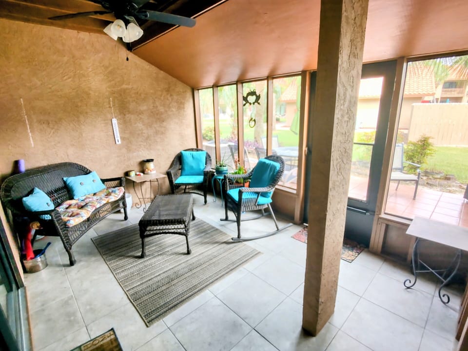 Screened in Sunroom adds more space.
pool is nearby