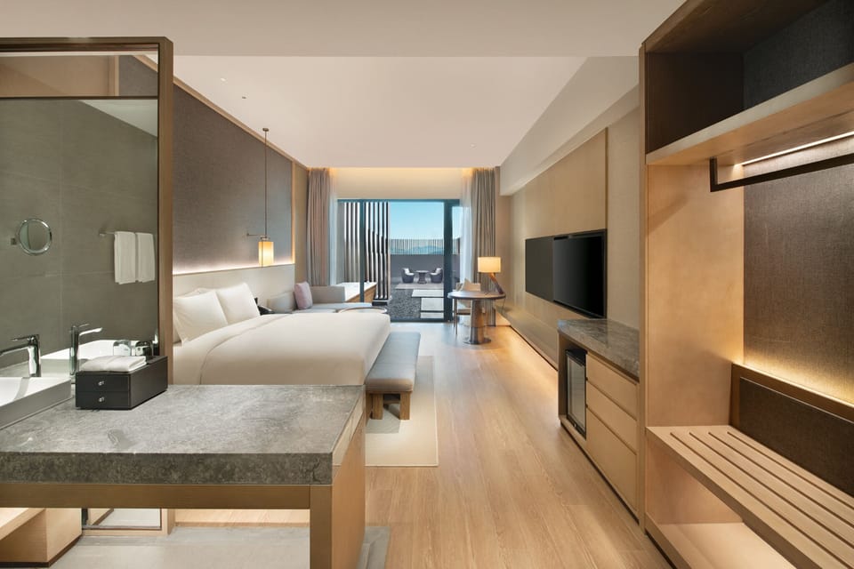 1 King Bed Standard Hotspring Yard | Individually decorated, individually furnished, desk, laptop workspace
