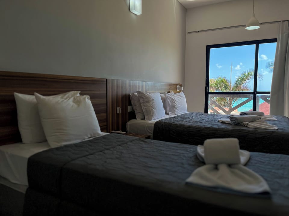 Superior Room, Sea View | Free minibar, in-room safe, free cribs/infant beds, free WiFi