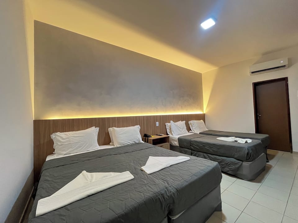 Standard Room, Garden View | Free minibar, in-room safe, free cribs/infant beds, free WiFi