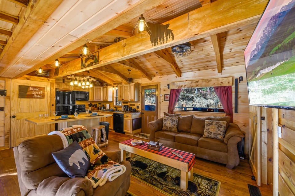 Smart TV with Recliner, Sleeper Sofa, Coffee Table Games by Vintage Lighting