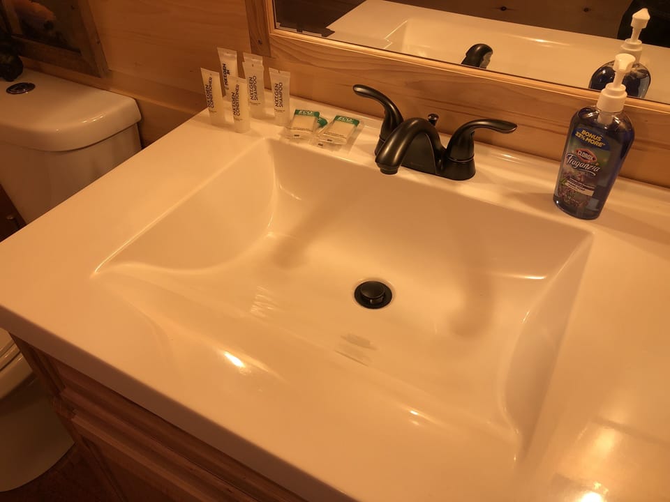 Bathrooms provide you with Shampoo, Conditioner, Lotion & Soap. NewSink & Mirror