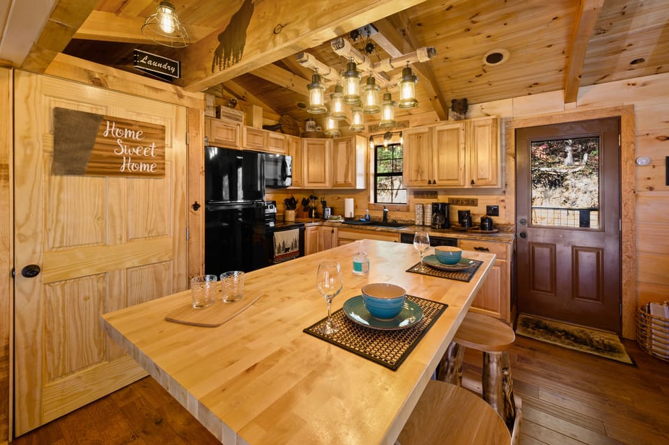 Expansive Island for food preparation, Washer/Dryer Closet, Kitchen to Back Deck